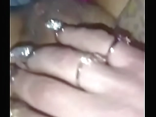 cartoon naked and stroking her shaved cock on the couch